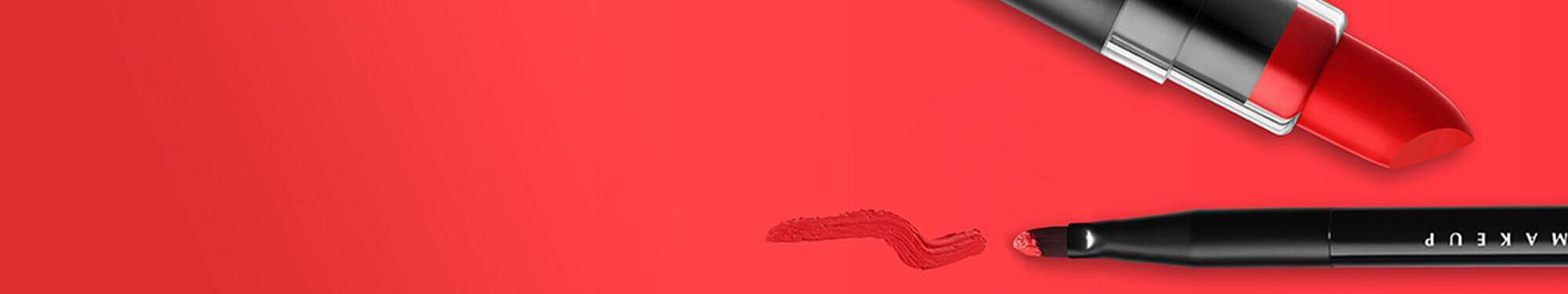 Czerwona farba z pędzlem na płotnie.