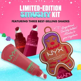 Zdjęcie limitowanej edycji zestawu NYX Professional Makeup Holiday Smushy Kit z trzema tubkami balsamu, otoczonymi cukierkowymi ikonami i śniegiem.
