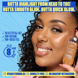 Smiling model holding a NYX Buttermelt Stix highlighter in a golden shade. Text reads: "Butta highlight from head to toe! Butta smooth glide, butta quick glow." Additional callouts: "No glitter fall-out, non-cakey, non-greasy feel." 8-hour wear badge and icons for vegan, cruelty-free, no retouching are included.